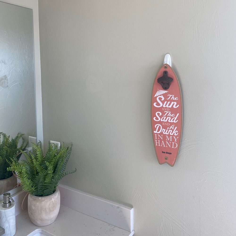 Hanging surfboard decor, bottle opener